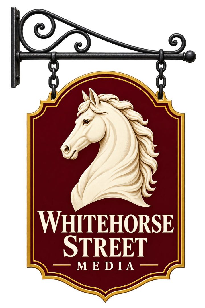 Official Whitehorse Street Media sign: a cream horse on an oxblood pub sign, hanging from a wrought iron bracket